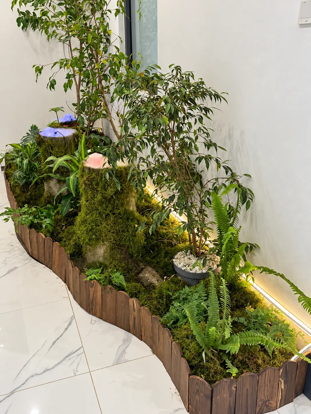 Full view of the completed indoor feature garden with the illuminated water-feature diffusers in place.